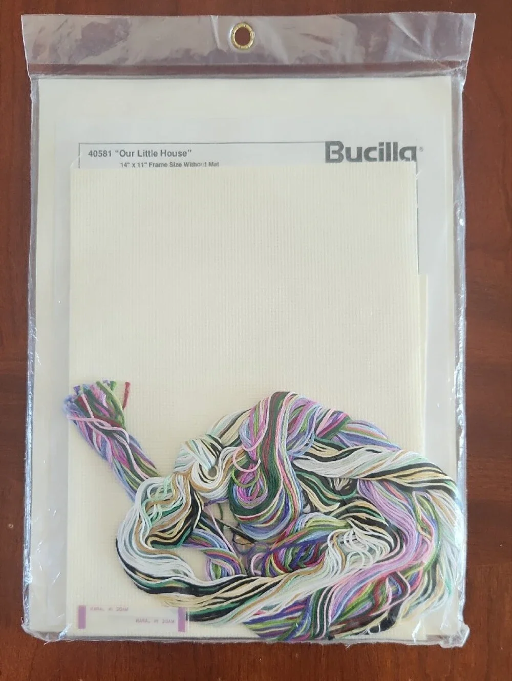 Bucilla counted cross-stitch kit with blue accents